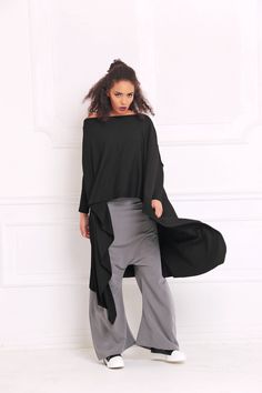 "Black Tunic Top, Asymmetric Tunic, Off Shoulder Top 🌟 Every order is sent out worldwide with EXPRESS 2-3 days delivery 🌟 Easily customizable Comfortable and the ideal gift idea Fitting every body type, suitable for every occasion Easily combined with accessories and other articles of clothing Adeptt Fashion is designed to flatter every body type and fit numerous occasions. We focus on the versatility of each model to make it a perfect match for your favorite accessories and wardrobe pieces! ? Flowy Long Sleeve Lagenlook Blouse, Flowy Long Sleeve Lagenlook Top, Flowy Lagenlook Long Sleeve Top, Lagenlook Flowy Long Sleeve Blouse, Oversized Blouse With Asymmetrical Hem For Layering, Oversized Asymmetrical Hem Blouse For Layering, Oversized Lagenlook Blouse For Fall, Oversized Tunic Lagenlook Blouse, Chic Oversized Asymmetrical Blouse