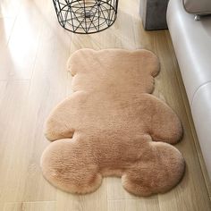 a teddy bear rug on the floor in a living room