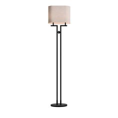 a black floor lamp with a white shade on the top and an off - white background