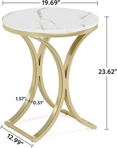 a white marble table with gold metal legs