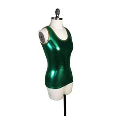 Metallic green tank top. It fits snug to the body, made of high-quality, 4-way stretch metallic with gold metallic trim. This would be great for a st patty's day party! Green Sleeveless Tank Top For Night Out, Shiny Stretch Sleeveless Tank Top, Shiny Fitted Tank Top For Night Out, Green Tank Top For Night Out, Fitted Metallic Tank Top For Night Out, Fitted Shiny Tank Top For Night Out, Metallic Fitted Tank Top, Fitted Green Tank Top, Green Stretch Tank Top For Party