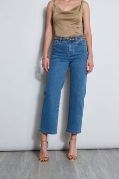 The "IT" Jean for Summer - we're obsessed with its effortless mid-rise silhouette & cropped wider leg. Crafted from our favorite Stretch Denim, these jeans will keep you comfortable and chic all day long - consider it a building block in your wardrobe. Elie Tahari Exclusive Wide Leg Stretch Denim Pant 80% Cotton, 12% Polyester, 7% Viscose, 1% Elastane Runs true to Size Measurements: Inseam 26"L, Front Rise 11"L (approx. length for size 6) Model is 5 '9 " and wearing size 2 Dry Clean Only Importe Cropped Denim Jeans With Five Pockets, Medium Wash Cropped Jeans With Five Pockets, Workwear Cropped Denim Jeans, Mid-rise Cropped Jeans In Medium Wash, Mid-rise Medium Wash Cropped Jeans With Belt Loops, Chic Medium Wash Cropped Jeans With Belt Loops, Chic Cropped Jeans In Medium Wash With Belt Loops, Rigid Denim Cropped Jeans With Belt Loops, Cropped Rigid Denim Jeans With Belt Loops