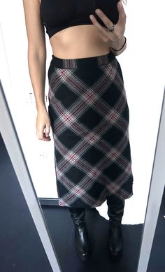 It's a Vintage black, white, red tartan midi skirt. The high waisted. Lined. Flared design. Mid calf length. Material: Wool blend. Size: S or M. Great vintage condition MEASUREMENTS: Wast doubled: 26 inch 68 cm. Hips doubled: 39 inch / 100 cm. Length: 32 inch 81 cm. Worldwide shipping. Shipping takes to: USA 7-14 days.  EU 4-7 days. Others countries 7-14 days. Winter Relaxed Fit Pencil Skirt, Casual Black Maxi Skirt For Winter, Black Lined Skirt For Winter, Stretch Winter Skirt, Winter Full-length Stretch Skirt, Winter Full Length Stretch Skirt, Black Midi Skirt For Winter, Plaid Lined Skirt For Winter, Black Pencil Skirt For Winter