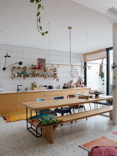 the kitchen is clean and ready to be used as a dining room or living area