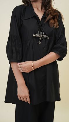 This co-ord set comes handcrafted in a very fine quality cotton fabric. The beautiful color and flowy silhouette makes it a must-have in your wardrobe. Its black colour adds a touch of vibrance to the outfit and makes it formal. This product doesn't include silver neck-piece. Luxury Black Kurta For Transitional Season, Luxury Semi-stitched Black Kurta, Black Co Ord Set, Cotton Co Ord Sets, Black Indian Outfit, Coord Sets, Sets Outfit, Black Indians, Coord Set