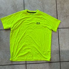 Never Worn. Neon Green/Yellow. Size Medium. Super Soft Under Armour Cotton Short Sleeve Shirt, Casual Green Under Armour Top, Casual Green Tops By Under Armour, Yellow Sports Shirt For Summer, Yellow Summer Sports Shirt, Yellow Sporty Shirt For Sports, Sporty Yellow Shirt For Sports, Yellow Cotton Sports T-shirt, Casual Neon Yellow Short Sleeve Tops