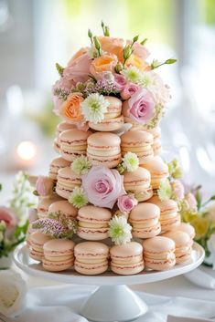 a wedding cake made out of macaroons and flowers