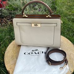 Coach Lane Satchel Is In Very Good Condition, Comes With Its Dust Cover And Its Crossbody Strap Has Some Small, Very Inconspicuous Stains, Please Check The Photos. Coach New York, Bags Coach, Satchel Bag, Dust Cover, Crossbody Strap, Satchel Bags, Coach Bags, Satchel, Bag Lady