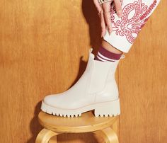 Our rain-or-shine Chelsea boot. Made with water-resistant cream calf, the BROOKE has a comfortable round toe and lightweight foam rubber lug sole that takes on the elements with ease. It’s an effortless pair of chunky socks styled with a feminine dress or your favorite denim and a trench coat. Chunky Socks, Cream Boots, Freda Salvador, Thick Socks, Feminine Dress, Sandals For Sale, Fashion Socks, Sneaker Heels, Chelsea Boot