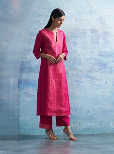 Achieve the ultimate festive allure fushia notch neck kurta set. Crafted from premium linen, it exudes an understated elegance accentuated by a subtle shimmer effect. The crisp neckline and A-line silhouette ensure a flattering fit for every body type, adding a touch of refinement to your look. Paired with straight palazzo, this ensemble epitomizes sophistication, making it the perfect choice for any upscale occasion. The sheer organza dupatta, adorned with meticulous patchwork and delicate hand Shifon Kurti Pattern, A Line Kurta Designs, Straight Kurta Designs, Pink Organza Suit, Linen Kurti Design, Organza Kurti Designs, Pakistani Kurta Designs, Organza Kurti, Khadi Kurta