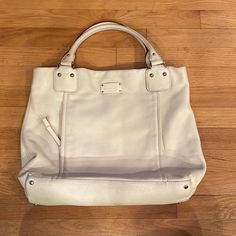 Good Used Condition. Two Front Separate Zip Compartments. Inside Has One Zip Pocket And Two Smaller Open Pockets. Snap Closure. Maroon Accents. Lining Is Blue And White Patterned. Kate Spade Bag, White Patterns, White Bag, Leather Handbags, Zip Pockets, Kate Spade, Satchel, Bag Lady, Blue And White