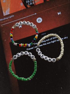 These stretchy handmade bracelets are fully customizable and come in all colors, sizes, and phrases. Although the default word is "WEEKND," you can customize it with any phrase you want whether that's "starboy," "stargirl," "xo," or any of your favorite song titles. The choice is yours. Get ready for the tour, or just show your admiration for The Weeknd with these bracelets. The Weeknd Jewelry, The Weeknd Beaded Bracelet, The Weekend Bracelet, The Weeknd Bracelet Ideas, Drake Beaded Bracelet, Weeknd Merch, Y2k Bracelets, Dawn Fm, Song Titles