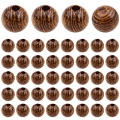 several wooden beads are arranged in rows on a white background