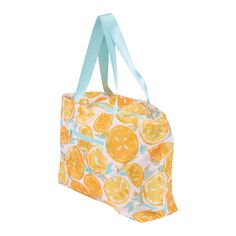 an orange print lunch bag with blue handles and two straps on the handle, sitting in front of a white background