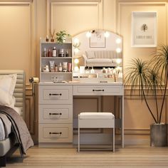 a bedroom scene with focus on the dressing table and vanity area that is lit up