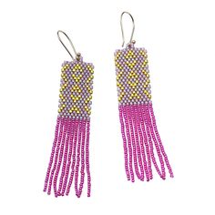 These beaded fringe earrings have a bold patterned top that flows to swingy fringe. Great day into night style! Glass beads with a gold-plated ear wire. 3.25" long. Made by artisans in Guatemala Artisan Dangle Tassel Earrings With Fringe, Artisan Tassel Dangle Earrings With Fringe, Long Drop Festival Earrings With Beaded Fringe, Artisan Fringe Tassel Dangle Earrings, Artisan Fringe Dangle Earrings, Summer Fringe Dangle Chandelier Earrings, Artisan Fringe Drop Earrings, Trendy Multicolor Fringe Earrings, Elegant Multicolor Beaded Earrings With Fringe