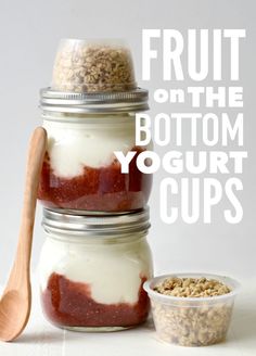 three jars filled with yogurt and granola sitting on top of each other