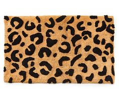 a leopard print rug on a white background