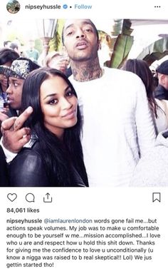 the rapper and his girlfriend are posing for a selfie in front of a crowd