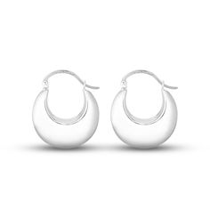 These stylish puff hoop earrings are crafted in classic sterling silver buffed to a polished luster. Measuring 28x23mm, the earrings secure with hinged backs. Everyday Rounded Earrings With Polished Finish, Everyday Polished Rounded Earrings, Everyday Rounded Polished Earrings, Elegant Sterling Silver Rounded Earrings, Elegant Rounded Sterling Silver Earrings, Elegant Silver Crescent Hoop Earrings, Modern Round Hinged Huggie Earrings, Modern Hinged Round Earrings, Sterling Silver Hoop Earrings With Shiny Finish