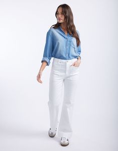 DESCRIPTION Elevate your everyday look with the Ava Vintage Shirt in Denim by White & Co. This essential Spring wardrobe staple offers a relaxed fit and a vintage wash, giving you that effortless yet stylish look. The soft, lightweight blue denim pairs perfectly with its button-down front, chest pocket, and subtle fading for a lived-in look. Team this shirt with your favourite white jeans for a fresh, on-trend outfit. Whether you're grabbing brunch with friends or jetting off on a holiday, the A Spring Wardrobe, Vintage Shirt, A Holiday, Denim Shirt, Vintage Denim, Vintage Shirts, Everyday Look, Chest Pocket, White Jeans