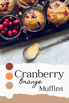 cranberry orange muffins with berries in the background