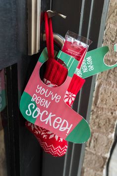 a stocking hanging from a door handle that says you've been socked