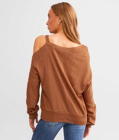 Women's Cold Shoulder Top In Brown By Daytrip., Women's Chestnut Open weave raw edge top Bust measures 40 on size small Body length 23 1/2 on size small. 45% Rayon 30% Nylon 23% Polyester 2% Spandex. Machine wash cold gentle cycle. Do not bleach. Tumble dry low. Iron on low if necessary.. Measurements: Bust -Fullest part of bust with arms at sides. Waist -Circumference of natural waist: above belly button below rib cage. Hips -Standing with feet together fullest part of hips. WOMEN'S TOP SIZE CO Brown Relaxed Fit Knit Tops, Brown Cotton Knit Top For Fall, Brown Tops For Day Out In Winter, Brown Tops For A Winter Day Out, Brown Cotton Knit Top For Spring, Casual Brown Knit Top For Spring, Open Weave, Waist Circumference, Top For Women