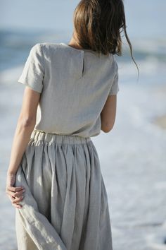 "Linen tank top ABIGAIL. Details: - Short sleeves top. Sleeve length about 19cm/7.5\". - Button closure in the back of a top. - Shirts with splits on the sides. Split length about 10cm/4\". - OEKO-TEX certificated 100% Lithuanian linen ; - medium weight linen; - handmade by Linen Di; CARE: - machine wash and machine dry gentle. * Please note that actual colors may vary due to your computer resolution and monitor color restrictions. * Please note that all garment measurements are approximate as t Fitted Linen Blouse For Beach, Fitted Linen Blouse For The Beach, Beige Linen Tops For The Beach, Linen Crew Neck Beach Top, Linen Crew Neck Top For Beach, Beige Linen Tops For Vacation, Summer Linen V-neck Blouse, Beach Linen Beige Blouse, Beach Beige Linen Blouse