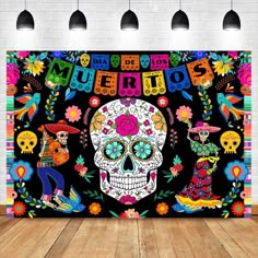 a large colorful sugar skull on a black background with the words muertos written above it