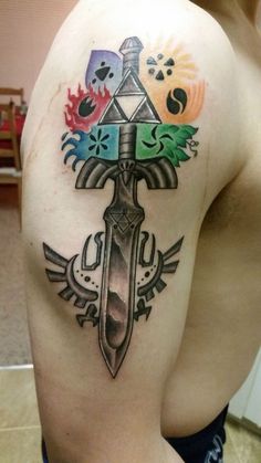 If you think about some legendary and recognizable ink the Triforce tattoo might grace your skin after reading this article. There is everything you need to know about this design. So let’s start! Nintendo Tattoo, 27 Tattoo, Video Game Tattoos, Tato Tradisional, Gamer Tattoos, Zelda Tattoo, Tattoo Filler, Omerta Tattoo, Men Tattoos