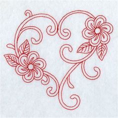 a heart with flowers and leaves in the middle is embroidered on top of a piece of paper