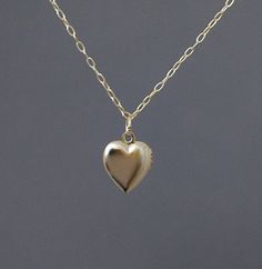 Tiny Gold Heart Locket Necklace Dainty Everyday Locket Necklace, Gold 14k Charms Locket Necklace, Gold 14k Gold Charms Locket Necklace, Gold Locket Necklace With Charms, Gold 14k Locket Necklace With Charms, Everyday Gold Pendant Locket Necklace, Minimalist Locket Necklace For Wedding, Simple Gold Charm Necklaces With Heart Pendant, Dainty 14k Gold Locket Necklace