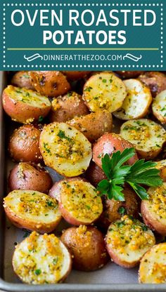 oven roasted potatoes with parsley on top in a baking pan and text overlay that reads oven roasted potatoes