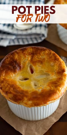 two pies sitting on top of each other with the words pot pies for two above them