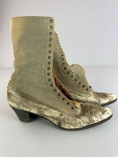 "Antique boots from the Victorian Edwardian era. They are fashioned of leather & Canvas and are/were beige in color. The condition is fair. These boots are missing the laces, and the leather is worn. They are still a great addition to your antique clothing collection!  MEASUREMENTS: (Measurements are taken outside of the boot) Heel to Toe: 9 1/2\" Bottom of sole at the widest point: 3\" The boots are 10\" high from the top of the boot to heel. SHIPPING: Once your order is processed you can expect your package to ship the next business day and arrive in 2 to 5 business days. MORE: Like what you see? Find more listings in my shop here: https://www.etsy.com/shop/mmmoonchild Message me if you have any more questions!" Vintage Lace-up Boots With Pointed Toe And Leather Sole, Victorian Boots With Leather Sole, Historical Round Toe Formal Boots, Historical Formal Boots With Round Toe, Historical Round Toe Boots For Formal Occasions, Victorian Leather Boots For Formal Occasions, Victorian Boots With Leather Sole For Fall, Vintage Lace-up Boots For Formal Occasions, Vintage Lace-up Boots With Cap Toe And Leather Sole