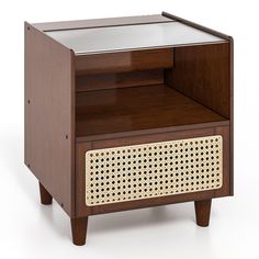 an old fashioned wooden radio cabinet with wicker inserts on the front and sides