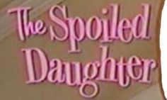 the spooked daughter logo is shown in pink and purple letters on a beige background