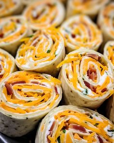 several rolls with cheese and bacon on them