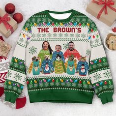 the brown's christmas sweater is on display next to presents