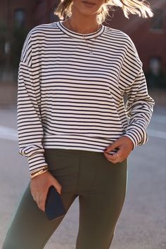 Feel elevated and sophisticated in our Another Coffee Striped Top, a stylish take on a classic design. This timeless striped top features a rounded neckline and a relaxed fit for maximum comfort. Soft and stretchy, it's perfect for lounging or a brunch date. Enjoy versatile style for any occasion, from work to school to errands. Sophisticated, cozy, and chic – you can't go wrong! Fabric 58% Cotton, 34% Polyester, 8% Spandex Brunch Date, Rounded Neckline, Versatile Style, Classic Design, Relaxed Fit, Spandex, Coffee, Fabric, Design