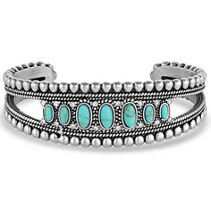 Luckily for you, our Lucky Roads cuff bracelet is incredibly versatile and easy to wear. From its cuff style to its gorgeous turquoise stones, it's a wonderful way to personalize any outfit. This silver tone cuff has raised beading trim that perfectly outlines seven oval turquoise stones for a symmetrical and elegant design. Wear it alone or pair it with other pieces to create a signature look. Western Cuff Bracelet, Montana Silversmith Jewelry, Western Bracelets, Turquoise Western, Fabrication Tools, Create A Signature, Turquoise Bracelet Cuff, Turquoise Cuff, Turquoise Stones