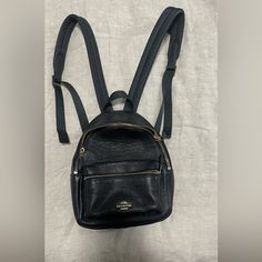 Black Coach Mini Backpack. Never Used. Coach Authenticity Badge On The Inside. See Picture. Coach School Backpack With Zipper Closure, Classic Coach Leather Backpack With Zipper, Classic Coach Leather Backpack With Zipper Closure, Coach Leather Backpack With Zipper For Travel, Coach Leather Backpack For On-the-go, Coach Black School Backpack, Chic Black Crossbody Backpack, Coach Everyday Satchel Backpack, Coach Everyday Backpack