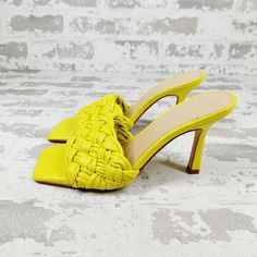 New Brand: Marc Fisher Pattern: Solid Type: Sandal Department: Women Color: Yellow Heel Style: Stiletto Style: Slide Upper Material: Leather Chic Spring Mules With Woven Leather, Chic Woven Leather Mules For Spring, Summer Faux Leather Heels With Heel Loop, Summer Faux Leather Closed Toe Heels, Chic Synthetic Mules With Woven Leather, Summer Pointed Toe Faux Leather Mules, Chic Yellow Square Toe Sandals, Summer Heels With Heel Strap In Faux Leather, Summer Woven Leather Heels, Synthetic Material