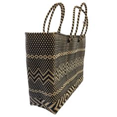 Oaxaca tote Bag, Handmade Mexican Bag, Getaways bag, Travel Bag, Basket, Beach Bag,vegan bag ,Plastic Woven, Oaxaca Bag, recycled plasticThe specifics are impressive: the bag is woven from a heavy duty, pliable plastic that is near indestructible. The weave is so tight, the bag is waterproof, which alone makes it uniqueApproximate measurements.13.5 h x 17 w x 5.5 d34 x 43 cmPlease note, since this piece is made by hand there may be some imperfections. Instead of viewing this as a mistake, let it Large Eco-friendly Beach Bag For Shopping, Large Eco-friendly Woven Bag, Large Eco-friendly Beach Bag For Daily Use, Eco-friendly Black Bags With Braided Handles, Eco-friendly Black Beach Bag, Black Handwoven Basket Bag, Eco-friendly Woven Shopping Bag, Eco-friendly Rectangular Beach Bag For Shopping, Black Rectangular Recyclable Bag