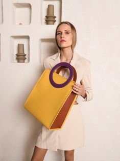 Handbag with round handles, summer office bag, Large shoulder purse for women. This lightweight yellow handbag is the perfect bag for work and the best choice for summer handbag. Spacious handbag Buttercup - harmony and ingenious minimalism.  ▪️  Inside the bag - dirt resistant  lining and one zippered leather pocket for phone/keys; ▪️  Handbag safely closes with zipper; ▪️  It has one detachable strap, which is 1 meter long; ▪️  Measurements: 13.8 x 11.8 x 5.9 in (35 x 30 x 15 cm.) COLOR: We ca Summer Handbag, Summer Office, Summer Handbags, Yellow Handbag, Office Bag, Purse For Women, Leather Pocket, Handmade Handbags, Gift For Wife