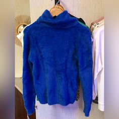 High Neck Blue Sweater. 100% Nylon Made In Italy Chic Blue Turtleneck Sweater, Blue Turtleneck Outerwear For Fall, Casual Blue Turtleneck Outerwear, Chic Stretch Blue Outerwear, Blue Stretch Winter Outerwear, Blue Stretch Outerwear For Winter, Blue Sweater, Blue Sweaters, High Neck