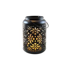 a black candle holder with an intricate design on the front and sides, holding a lit candle