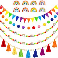 a rainbow party decoration with tassels and pom poms on a white background