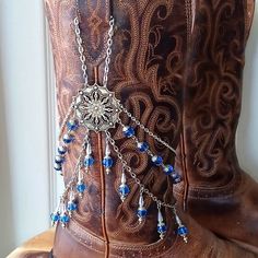 One Of A Kind Handmade Royal Blue Glass Bead Boot Jewelry Boot Bracelet Boot Chain This Exact Piece Was Awarded A Blue Ribbon From The State Fair Of Texas In 2023! Very Simple Design The Top Chains Secure Behind The Pull With A Lobster Clasp! Jewelry Won't Move Around Or Accidentally Be Stepped On, I Designed These To Be Worn Even While Dancing! This Is A Very Unique Piece Of Boot Jewelry! The Focal Point Of This Bootlery Is An Incredibly Ornate, Tibetan Style Earring Component, Boasting 2 Chain Western Boot Jewelry, Boot Bling Jewelry, Western Accessories Women, Blue Beaded Bracelets With Silver Beads For Festivals, Blue Nickel-free Beaded Bracelets For Festivals, Blue Beaded Jewelry, Western Jewerly, State Fair Of Texas, Boot Charms